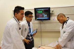 UH medical students training in the school's simulated patient laboratory.