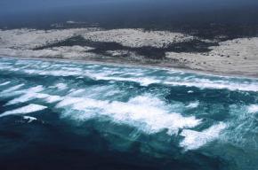 <p><strong>Fig. 5.2.</strong> Arial view of large surf zone in South Australia (Dog Fence Beach, western Eyre Peninsula)</p>
