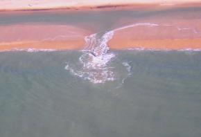 <p><strong>Fig. 5.20.</strong> (<strong>A</strong>) A warning sign explains rip current dangers and how to avoid them.</p>
