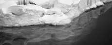 image of ocean with ice illustrating water cycles from frozen to liquid with input of energy