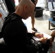<p><strong>Fig. 2.7. </strong>(<strong>C</strong>) A research diver plans a dive.</p>