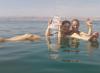 <p>Image courtesy of Christina Roeschel and Valerie Blaisdell Presdee</p> <p><strong>SF. Fig. 2.7. </strong>Catching up on the news in the Dead Sea. Try doing this in the ocean or a freshwater lake! </p>
